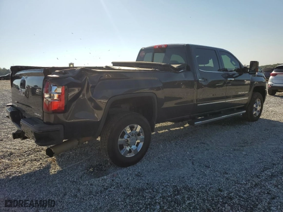 2015 GMC Sierra 3500HD Denali with VIN 1GT424E86FF533171, listed as a Copart auction lot 74837874 with 128,234 mi miles and Salvage Title. Bid and sale history available at carsss.com. Image 3.