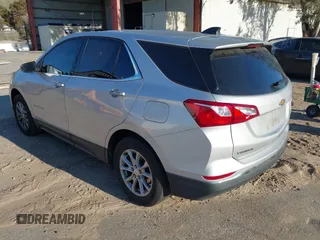 2020 Chevrolet Equinox LT with VIN 2GNAXUEV7L6111580, listed as a IAAI auction lot 41830060 with 96,968 mi miles and . Bid and sale history available at DreamBid. Image 3.