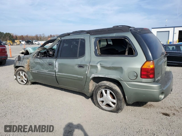 2004 GMC Envoy XL SLE with VIN 1GKET16S346115131, listed as a Copart auction lot 82677024 with 290,656 mi miles and Salvage Title. Bid and sale history available at carsss.com. Image 2.