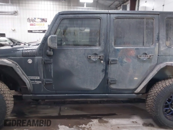 2018 Jeep Wrangler JK Unlimited Sport with VIN 1C4BJWDG0JL867687, listed as a IAAI auction lot 41426838 with 78,116 mi miles. Bid and sale history available at carsss.com. Image 14.
