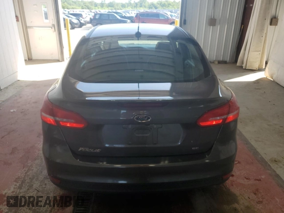 2018 Ford Focus SE z VIN 1FADP3F25JL257815, wystawiony jako Copart lot #61978045 z przebiegiem 62 328 mil mil oraz Szkoda całkowita • Salvage title. Historia ofert i sprzedaży dostępna na DreamBid. Obrazek 6.