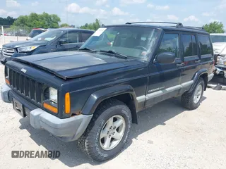 2000 Jeep Cherokee z VIN 1J4FF48S7YL273642, wystawiony jako IAAI lot #42743391 z przebiegiem 200 780 mil mil oraz . Historia ofert i sprzedaży dostępna na DreamBid. Obrazek 2.