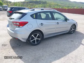 2023 Subaru Impreza Premium z VIN 4S3GTAV66P3704916, wystawiony jako IAAI lot #42149703 z przebiegiem 12 164 mil mil oraz . Historia ofert i sprzedaży dostępna na DreamBid. Obrazek 4.