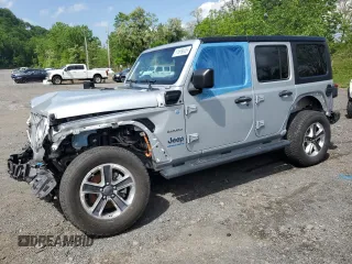 2023 Jeep Wrangler Sahara с VIN 1C4JJXP65PW661129, выставлен на аукционе Copart как лот 57599005 с пробегом 46 287 миль миль и Списание • Salvage title. История ставок и продаж доступна на DreamBid. Изображение 1.