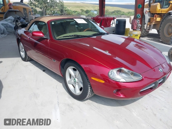 1997 Jaguar XK with VIN SAJGX274XVC004952, listed as a IAAI auction lot 42211023 with 109,889 mi miles and . Bid and sale history available at DreamBid. Image 1.