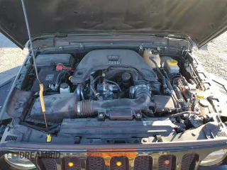 2021 Jeep Wrangler Sport S with VIN 1C4HJXAG6MW557583, listed as a Copart auction lot 88603685 with 28,325 mi miles and Salvage Title. Bid and sale history available at DreamBid. Image 12.