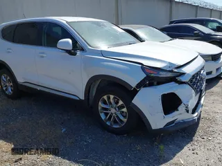 2020 Hyundai Santa Fe SE z VIN 5NMS23AD8LH285363, wystawiony jako IAAI lot #42408647 z przebiegiem 60 058 mil mil oraz . Historia ofert i sprzedaży dostępna na DreamBid. Obrazek 1.