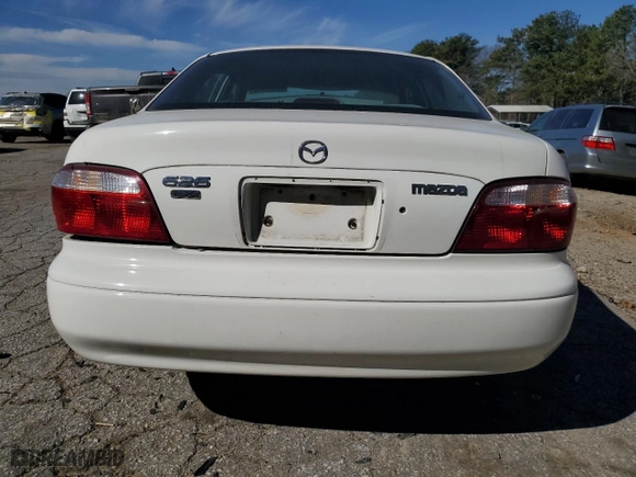 2001 Mazda 626 LX with VIN 1YVGF22C815240640, listed as a Copart auction lot 47609315 with 0 mi miles and Salvage Title. Bid and sale history available at carsss.com. Image 6.