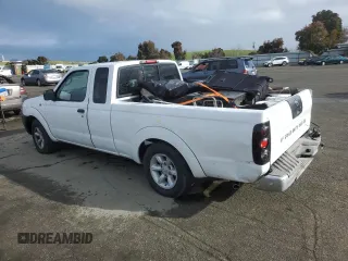 2002 Nissan Frontier XE with VIN 1N6DD26S42C334251, listed as a Copart auction lot 49308145 with 202,805 mi miles and Salvage title. Bid and sale history available at DreamBid. Image 2.