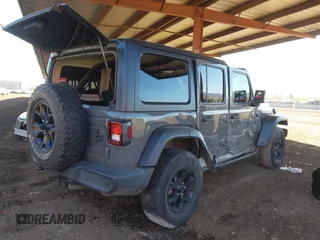 2021 Jeep Wrangler Unlimited Sport S with VIN 1C4HJXDG5MW695014, listed as a IAAI auction lot 41692838 with 66,247 mi miles and . Bid and sale history available at DreamBid. Image 4.