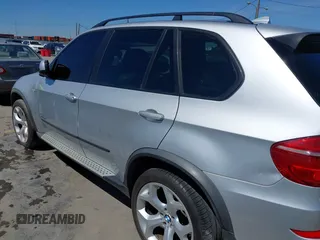 2012 BMW X5 35d z VIN 5UXZW0C5XCL665504, wystawiony jako IAAI lot #41835285 z przebiegiem 134 245 mil mil oraz . Historia ofert i sprzedaży dostępna na DreamBid. Obrazek 6.