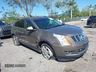 2014 Cadillac SRX Luxury Collection z VIN 3GYFNEE3XES587233, wystawiony jako IAAI lot #41747779 z przebiegiem 116 571 mil mil oraz . Historia ofert i sprzedaży dostępna na DreamBid. Obrazek 1.
