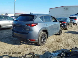 2021 Mazda CX-5 Touring with VIN JM3KFBCM8M0452700, listed as a IAAI auction lot 41490600 with 37,865 mi miles. Bid and sale history available at carsss.com. Image 4.
