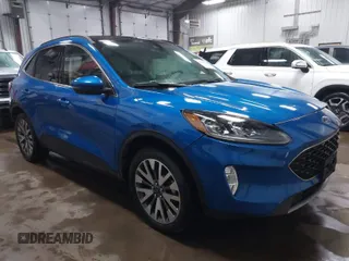 2020 Ford Escape Titanium z VIN 1FMCU9J98LUB05414, wystawiony jako IAAI lot #41673722 z przebiegiem 28 878 mil mil oraz . Historia ofert i sprzedaży dostępna na DreamBid. Obrazek 1.