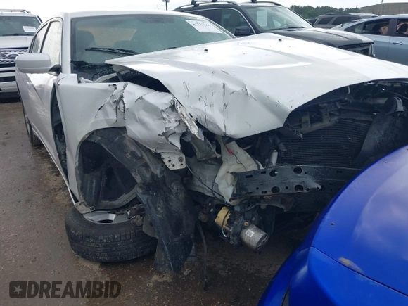 2013 Dodge Charger SE z VIN 2C3CDXBG0DH531483, wystawiony jako IAAI lot #42131266 z przebiegiem Nie podano mil oraz . Historia ofert i sprzedaży dostępna na DreamBid. Obrazek 1.
