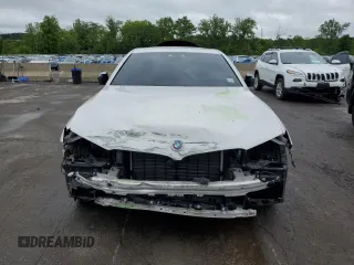 2019 BMW 5 Series 540i xDrive with VIN WBAJE7C58KWW37088, listed as a Copart auction lot 57759905 with 64,621 mi miles and Salvage title. Bid and sale history available at DreamBid. Image 5.