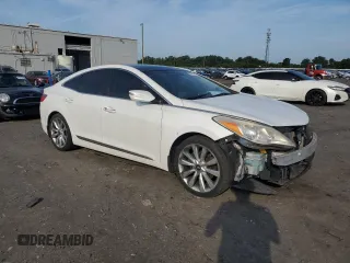 2013 Hyundai Azera с VIN KMHFH4JG4DA330015, выставлен на аукционе Copart как лот 62757555 с пробегом 128 339 миль миль и Чистый • Clean title. История ставок и продаж доступна на DreamBid. Изображение 4.