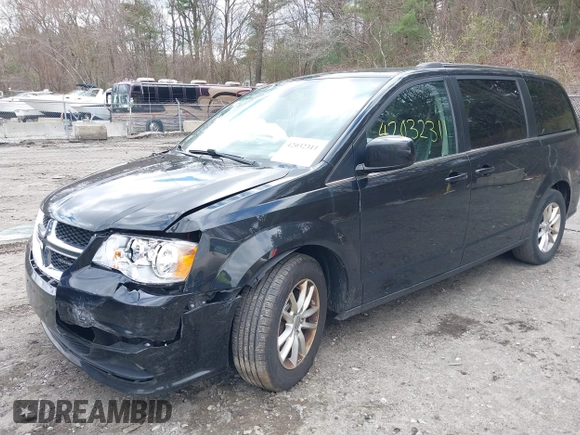 2019 Dodge Grand Caravan SXT with VIN 2C4RDGCG9KR804867, listed as a IAAI auction lot 42032311 with 157,351 mi miles and . Bid and sale history available at DreamBid. Image 17.