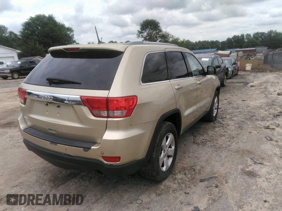 2012 Jeep Grand Cherokee Laredo with VIN 1C4RJEAGXCC157616, listed as a IAAI auction lot 42156539 with 301,661 mi miles. Bid and sale history available at carsss.com. Image 4.