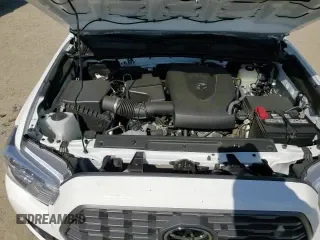 2022 Toyota Tacoma SR5 z VIN 3TMDZ5BN2NM128581, wystawiony jako Copart lot #69082095 z przebiegiem 18 215 mil mil oraz Szkoda całkowita • Salvage title. Historia ofert i sprzedaży dostępna na DreamBid. Obrazek 13.