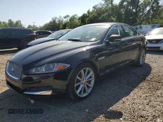 2015 Jaguar XF V6 Portfolio with VIN SAJWJ0FFXF8U60040, listed as a Copart auction lot 52912695 with 112,618 mi miles and Salvage Title. Bid and sale history available at carsss.com. Image 1.