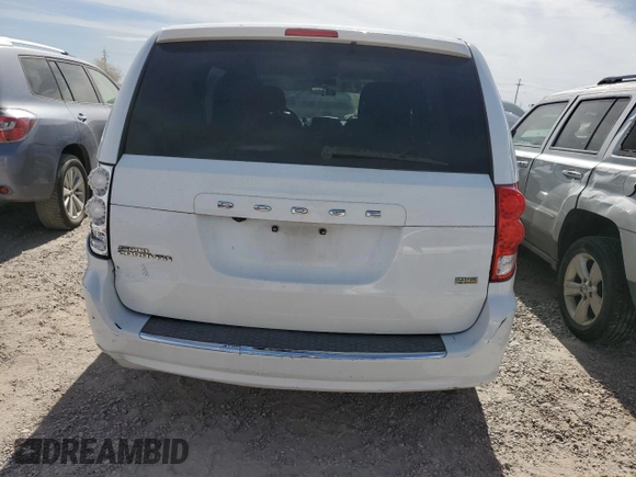 2017 Dodge Grand Caravan SE Plus z VIN 2C4RDGBG1HR864328, wystawiony jako Copart lot #56435325 z przebiegiem 128 795 mil mil oraz Szkoda całkowita • Salvage title. Historia ofert i sprzedaży dostępna na DreamBid. Obrazek 6.