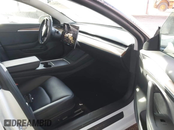 2022 Tesla Model 3 Long Range with VIN 5YJ3E1EB1NF236969, listed as a IAAI auction lot 41525117 with 24,215 mi miles and . Bid and sale history available at DreamBid. Image 5.