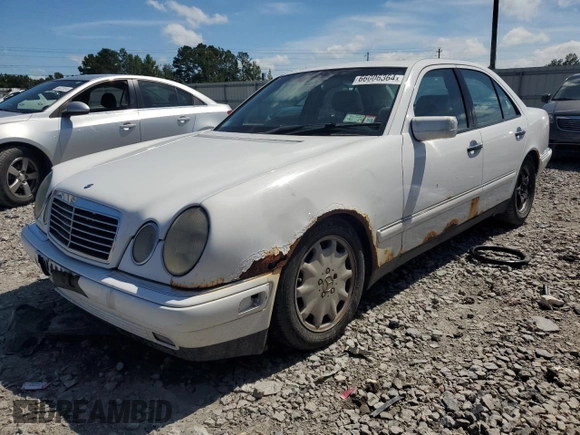 1999 Mercedes-Benz E-Class with VIN WDBJF65H0XA877630, listed as a Copart auction lot 69697454 with 0 mi miles and Salvage Title. Bid and sale history available at carsss.com. Image 1.