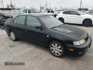 2002 Infiniti G20 Luxury z VIN JNKCP11A52T509703, wystawiony jako Copart lot #56278004 z przebiegiem 222 049 mil mil oraz Szkody całkowita. Historia ofert i sprzedaży dostępna na DreamBid. Obrazek 4.