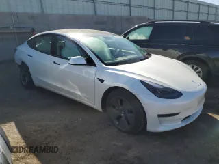 2022 Tesla Model 3 Long Range with VIN 5YJ3E1EB4NF249277, listed as a Copart auction lot 45952725 with Not Provided miles and Salvage Title. Bid and sale history available at DreamBid. Image 4.