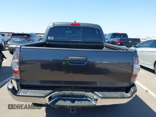 2015 Toyota Tacoma PreRunner with VIN 3TMJU4GNXFM191661, listed as a IAAI auction lot 42453516 with 145,898 mi miles and . Bid and sale history available at DreamBid. Image 6.