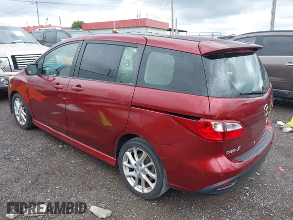 2012 Mazda 5 Grand Touring with VIN JM1CW2DLXC0134997, listed as a IAAI auction lot 42360574 with 230,951 mi miles and . Bid and sale history available at DreamBid. Image 3.
