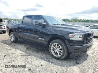 2023 Ram 1500 Laramie with VIN 1C6SRFRT1PN577199, listed as a Copart auction lot 64833895 with 22,119 mi miles and Salvage title. Bid and sale history available at DreamBid. Image 4.