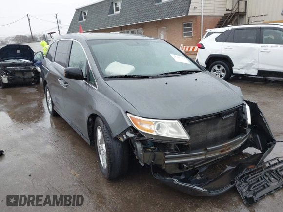 2011 Honda Odyssey Touring Elite with VIN 5FNRL5H9XBB090616, listed as a IAAI auction lot 41944510 with 207,962 mi miles and . Bid and sale history available at DreamBid. Image 1.