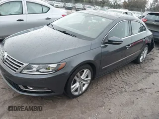 2014 Volkswagen CC Lux with VIN WVWRP7AN6EE520381, listed as a IAAI auction lot 41338169 with 130,363 mi miles. Bid and sale history available at carsss.com. Image 2.