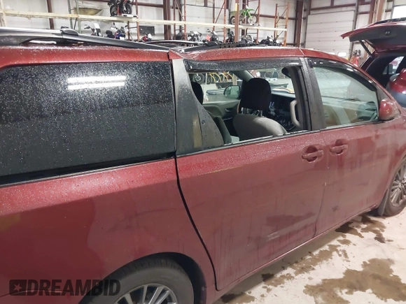 2015 Toyota Sienna LE AAS with VIN 5TDKK3DC8FS655876, listed as a IAAI auction lot 42298949 with 93,459 mi miles and . Bid and sale history available at DreamBid. Image 6.
