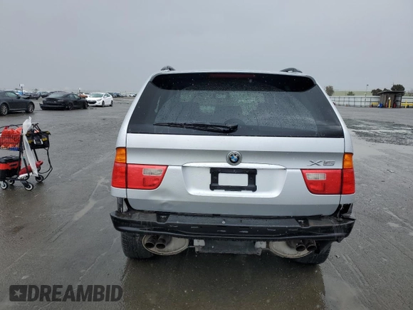 2001 BMW X5 4.4i with VIN WBAFB33571LH19064, listed as a Copart auction lot 49243495 with 295,923 mi miles and Non Repairable. Bid and sale history available at carsss.com. Image 6.