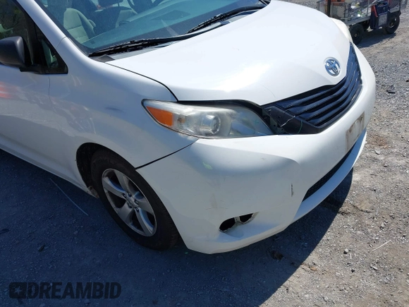 2015 Toyota Sienna L with VIN 5TDZK3DC3FS690484, listed as a IAAI auction lot 41888073 with 201,518 mi miles and . Bid and sale history available at carsss.com. Image 18.