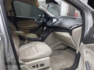 2015 Ford Escape Titanium with VIN 1FMCU0J96FUB81598, listed as a IAAI auction lot 41872114 with 122,001 mi miles and . Bid and sale history available at DreamBid. Image 5.