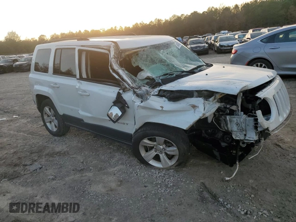 2016 Jeep Patriot Latitude with VIN 1C4NJRFB9GD718469, listed as a Copart auction lot 84938764 with 156,867 mi miles and Salvage Title. Bid and sale history available at carsss.com. Image 4.