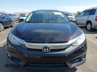 2018 Honda Civic EX-T z VIN 19XFC1F35JE200003, wystawiony jako IAAI lot #42393392 z przebiegiem 90 337 mil mil oraz . Historia ofert i sprzedaży dostępna na DreamBid. Obrazek 12.