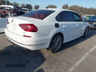 2018 Volkswagen Passat 2.0T S with VIN 1VWAA7A35JC009020, listed as a IAAI auction lot 41955626 with 99,900 mi miles. Bid and sale history available at carsss.com. Image 4.