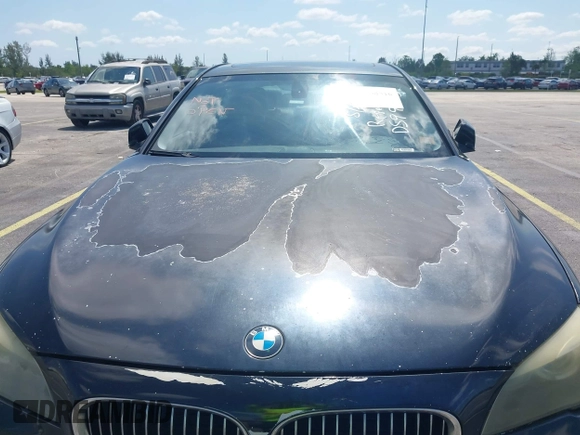 2012 BMW 7 Series 740i z VIN WBAKA4C50CDS99293, wystawiony jako IAAI lot #42208510 z przebiegiem 127 631 mil mil oraz . Historia ofert i sprzedaży dostępna na DreamBid. Obrazek 10.