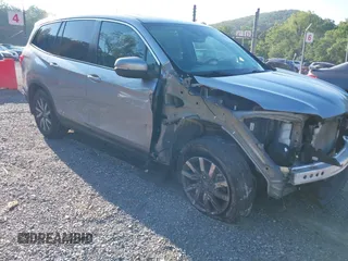 2020 Honda Pilot EX-L with VIN 5FNYF6H59LB036506, listed as a IAAI auction lot 42623859 with 88,009 mi miles and . Bid and sale history available at DreamBid. Image 1.
