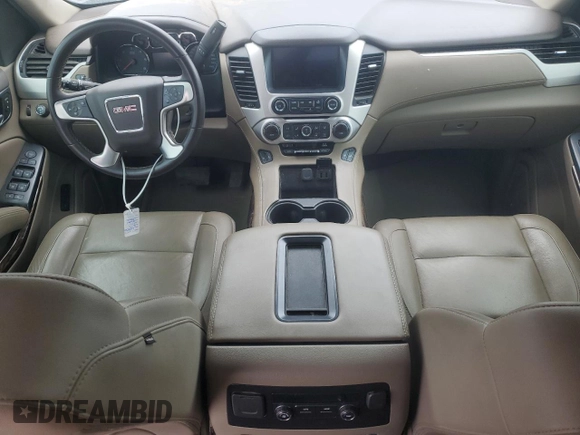 2019 GMC Yukon XL SLT Standard Edition z VIN 1GKS2JKC3KR233809, wystawiony jako Copart lot #56598965 z przebiegiem 109 077 mil mil oraz Czysty tytuł • Clean title. Historia ofert i sprzedaży dostępna na DreamBid. Obrazek 8.