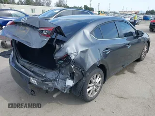 2016 Mazda Mazda3 i Sport with VIN JM1BM1U78G1280457, listed as a IAAI auction lot 42032762 with 122,779 mi miles. Bid and sale history available at carsss.com. Image 4.