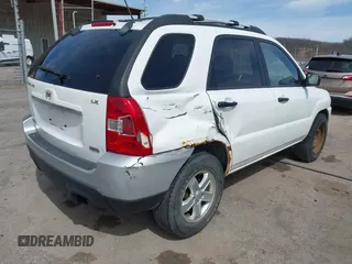 2009 Kia Sportage LX with VIN KNDJE723597560168, listed as a IAAI auction lot 41824779 with 110,386 mi miles. Bid and sale history available at carsss.com. Image 4.