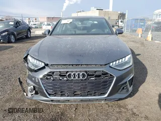 2022 Audi A4 S line Premium Plus z VIN WAUEAAF41NN015360, wystawiony jako IAAI lot #41320262 z przebiegiem 63 275 mil mil oraz . Historia ofert i sprzedaży dostępna na DreamBid. Obrazek 12.