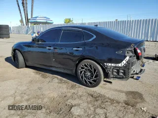 2013 Infiniti M with VIN JN1BY1AP3DM511240, listed as a Copart auction lot 49737185 with 116,644 mi miles and Salvage title. Bid and sale history available at DreamBid. Image 2.
