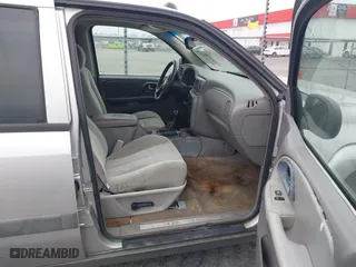 2005 Chevrolet TrailBlazer LS with VIN 1GNES16S956112497, listed as a IAAI auction lot 41486711 with 243,719 mi miles. Bid and sale history available at carsss.com. Image 5.